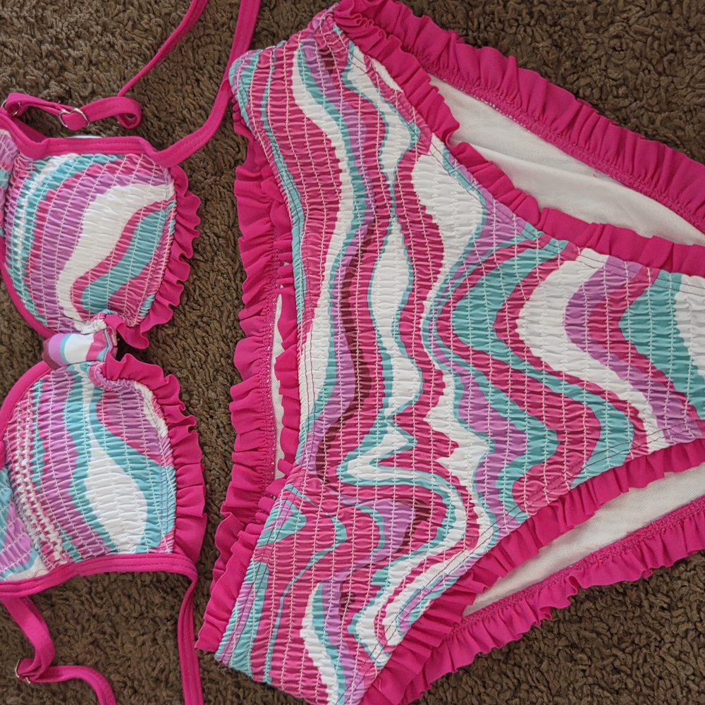 Vibrant Pink and Blue Bikini with Wavy Pattern